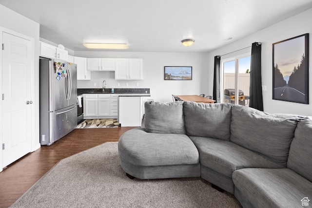 living area with dark wood-style flooring
