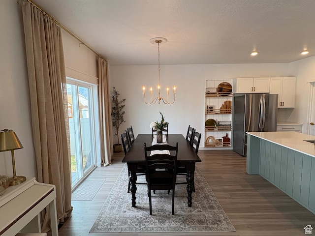 3452 W Pond Dr S, Lehi, UT 84043 - dining room featuring a chandelier, dark wood-type flooring, and recessed lighting