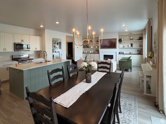 3452 W Pond Dr S, Lehi, UT 84043 - dining room featuring a chandelier, light wood-type flooring, and recessed lighting