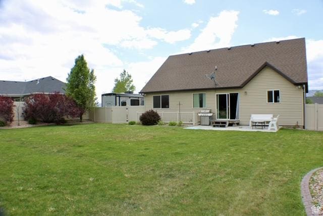 rear view of house with a patio area