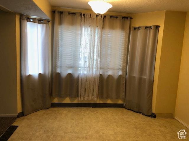 3923 W Rockwood Way Unit G, West Valley City, UT 84120 - unfurnished room with baseboards
