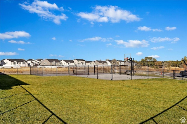 2085 W 1575th Ct S Unit 126, West Haven, UT 84401 - view of yard featuring community basketball court and a residential view