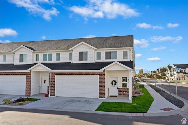 2085 W 1575th Ct S Unit 126, West Haven, UT 84401 - townhome / multi-family property with brick siding, a garage, and driveway