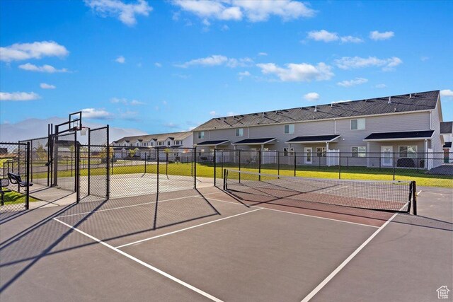 2085 W 1575th Ct S Unit 126, West Haven, UT 84401 - view of sport court featuring a residential view, fence, and a tennis court