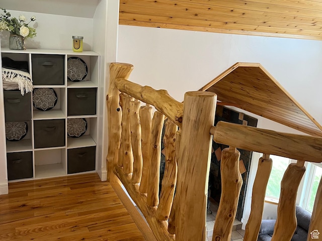 stairs with wood finished floors