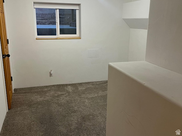 hall with carpet flooring