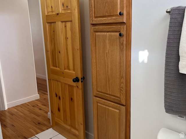 detailed view of wood finished floors and baseboards