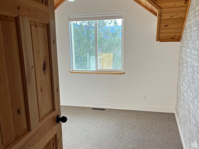 unfurnished bedroom featuring carpet and baseboards
