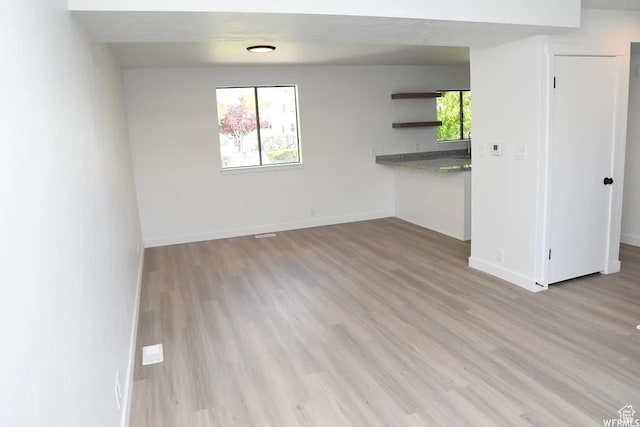 227 S W Ln, Provo, UT 84601 - unfurnished living room with wood finished floors and baseboards