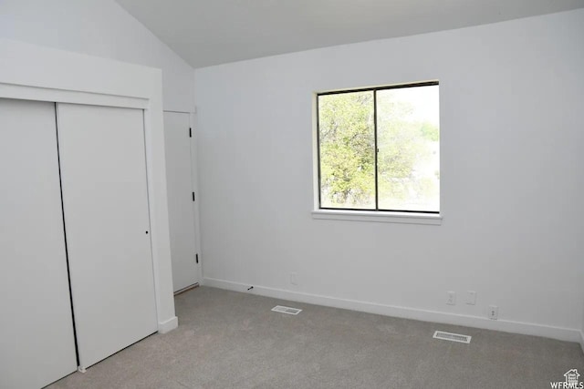 227 S W Ln, Provo, UT 84601 - unfurnished bedroom with carpet, baseboards, a closet, and lofted ceiling