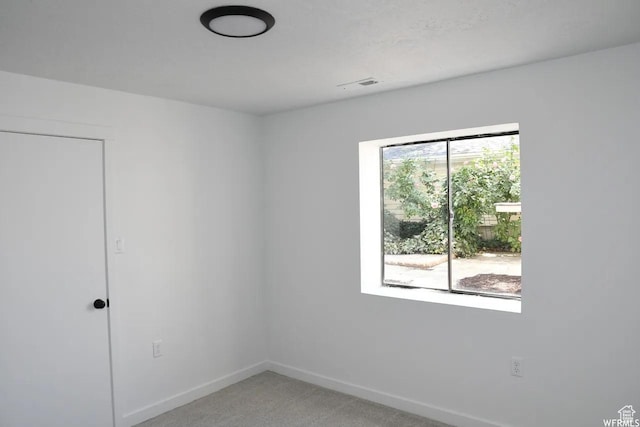 227 S W Ln, Provo, UT 84601 - spare room featuring baseboards and light carpet
