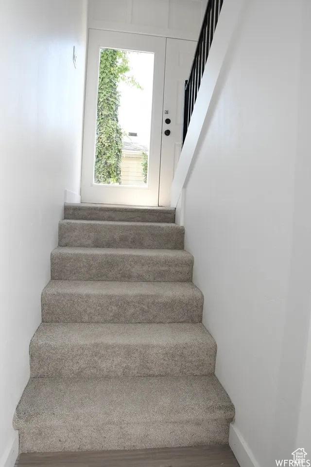 227 S W Ln, Provo, UT 84601 - staircase with wood finished floors and baseboards