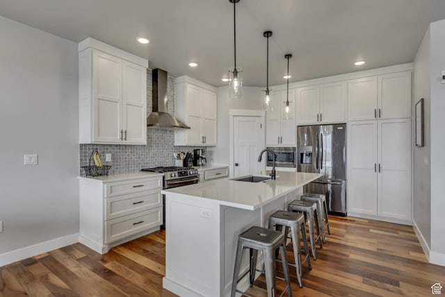 3537 S 5050 W, West Haven, UT 84401 - kitchen with wall chimney range hood, stainless steel fridge with ice dispenser, a sink, recessed lighting, and dark wood-style flooring