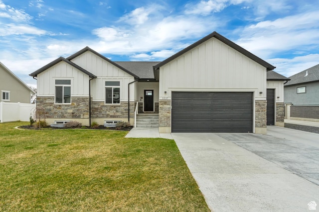 3537 S 5050 W, West Haven, UT 84401 - view of front of home featuring board and batten siding, stone siding, a garage, and concrete driveway