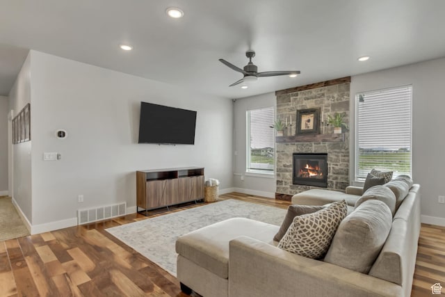 3537 S 5050 W, West Haven, UT 84401 - living area with a fireplace, ceiling fan, wood finished floors, baseboards, and recessed lighting