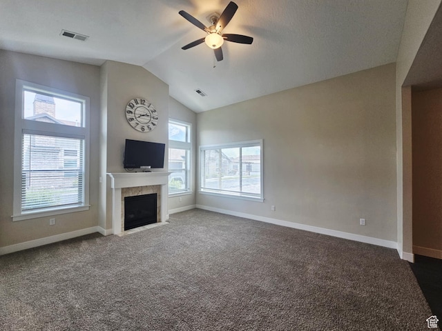 1704 W 300 S Unit Ud/L24, Mapleton, UT 84664 - unfurnished living room with lofted ceiling, plenty of natural light, ceiling fan, a fireplace, and carpet flooring