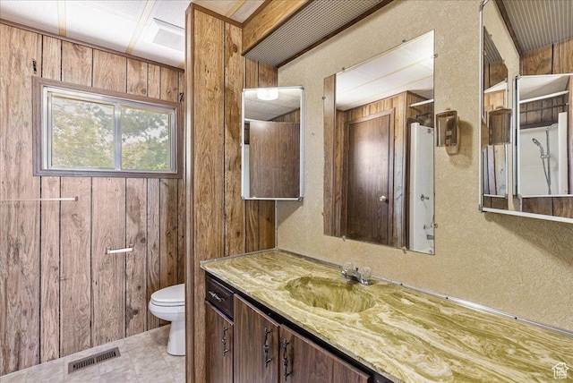 830 E Main St, Grantsville, UT 84029 - bathroom featuring toilet, wood walls, and vanity
