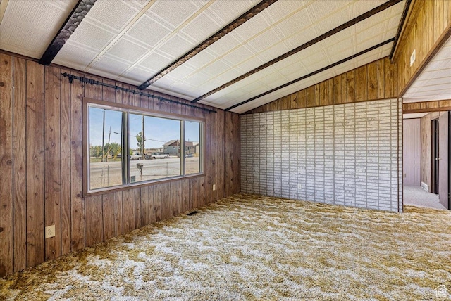830 E Main St, Grantsville, UT 84029 - empty room with wooden walls, vaulted ceiling, and carpet