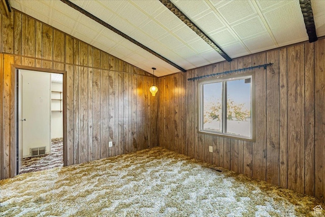 830 E Main St, Grantsville, UT 84029 - empty room with lofted ceiling, wooden walls, and carpet floors