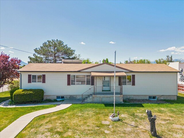 830 E Main St, Grantsville, UT 84029 - ranch-style home featuring a front lawn and a porch