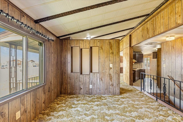 830 E Main St, Grantsville, UT 84029 - spare room featuring wood walls and carpet