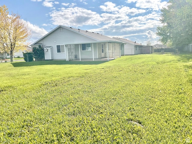 rear view of property with a patio area