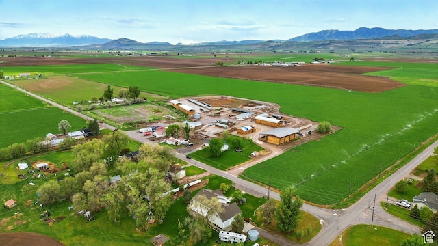 1170 N 1600 W, Lewiston, UT 84320 - aerial view of property's location featuring rural landscape, a mountain backdrop, and farmland