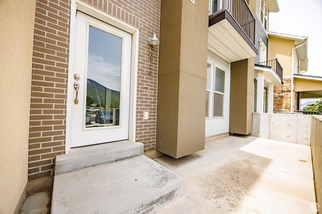 972 S High Ridge Rd, Spanish Fork, UT 84660 - entrance to property with brick siding, stucco siding, and a patio area