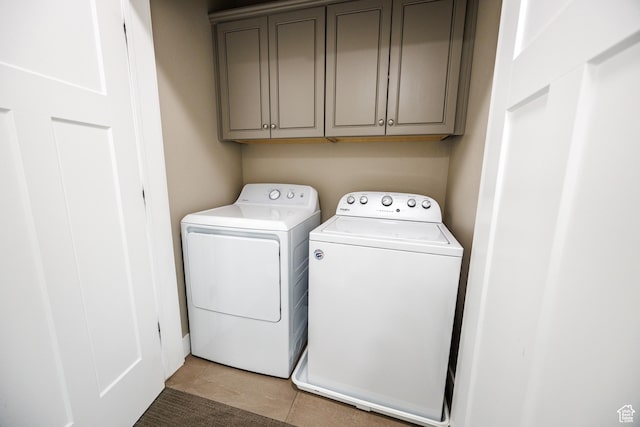 972 S High Ridge Rd, Spanish Fork, UT 84660 - washroom with washer and clothes dryer, cabinet space, and light tile patterned flooring