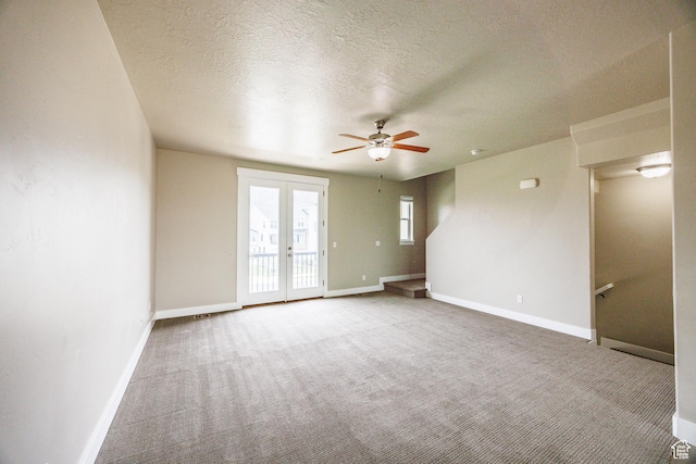 972 S High Ridge Rd, Spanish Fork, UT 84660 - carpeted empty room with ceiling fan, baseboards, a textured ceiling, and french doors