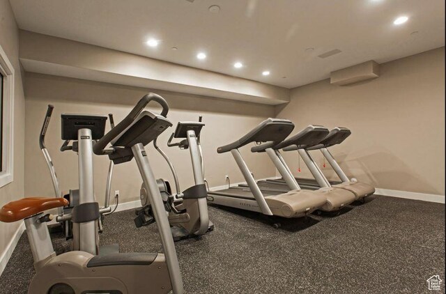 972 S High Ridge Rd, Spanish Fork, UT 84660 - workout area with baseboards, recessed lighting, and a wall mounted air conditioner