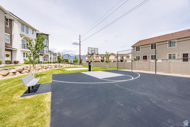 972 S High Ridge Rd, Spanish Fork, UT 84660 - view of sport court featuring basketball hoop and a residential view