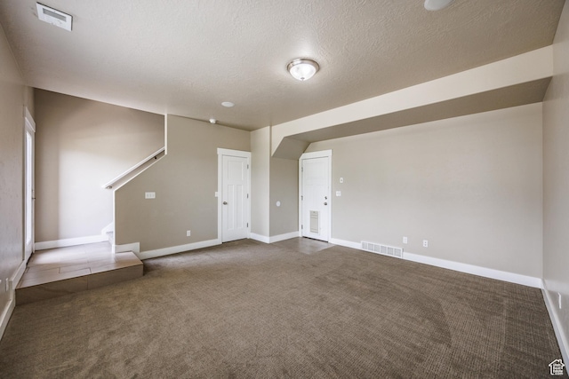972 S High Ridge Rd, Spanish Fork, UT 84660 - unfurnished living room featuring carpet, baseboards, and a textured ceiling