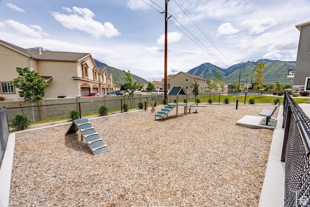 972 S High Ridge Rd, Spanish Fork, UT 84660 - view of jungle gym featuring a dog friendly area, a mountain view, fence, and a residential view