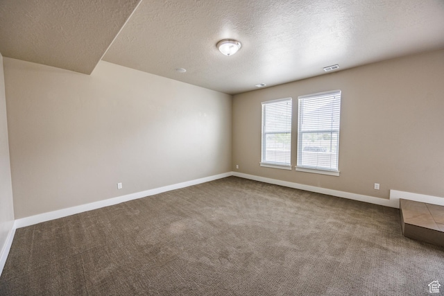 972 S High Ridge Rd, Spanish Fork, UT 84660 - carpeted empty room with a textured ceiling and baseboards