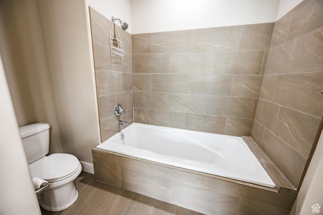 972 S High Ridge Rd, Spanish Fork, UT 84660 - full bath featuring toilet, tiled shower / bath combo, and wood finished floors