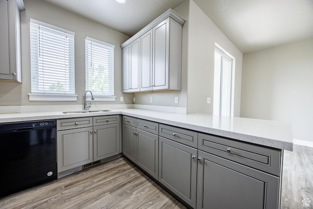 972 S High Ridge Rd, Spanish Fork, UT 84660 - kitchen featuring black dishwasher, a sink, gray cabinetry, and a peninsula