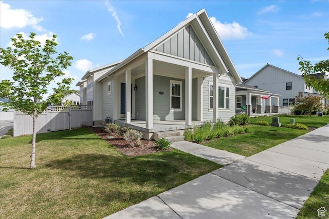 5153 W Lake Terrace Ave S, South Jordan, UT 84009 - view of front of house featuring board and batten siding, a porch, and a gate