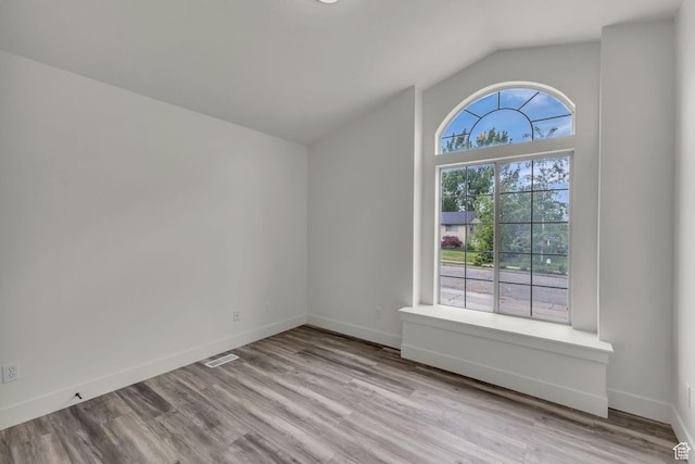 770 W 550 N, Clearfield, UT 84015 - empty room with vaulted ceiling, wood finished floors, and baseboards
