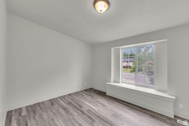770 W 550 N, Clearfield, UT 84015 - spare room with wood finished floors and baseboards