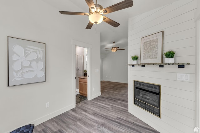 770 W 550 N, Clearfield, UT 84015 - unfurnished living room with a ceiling fan, baseboards, wood finished floors, and a fireplace