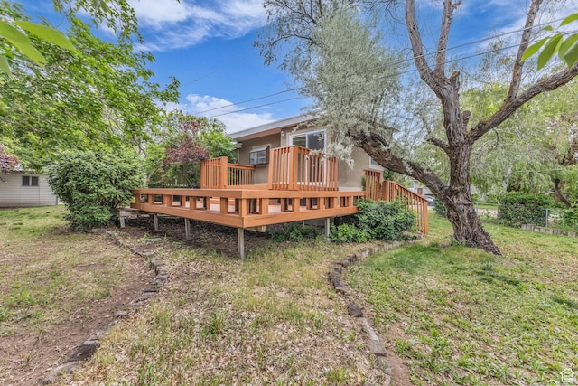 770 W 550 N, Clearfield, UT 84015 - back of house with a wooden deck and fence