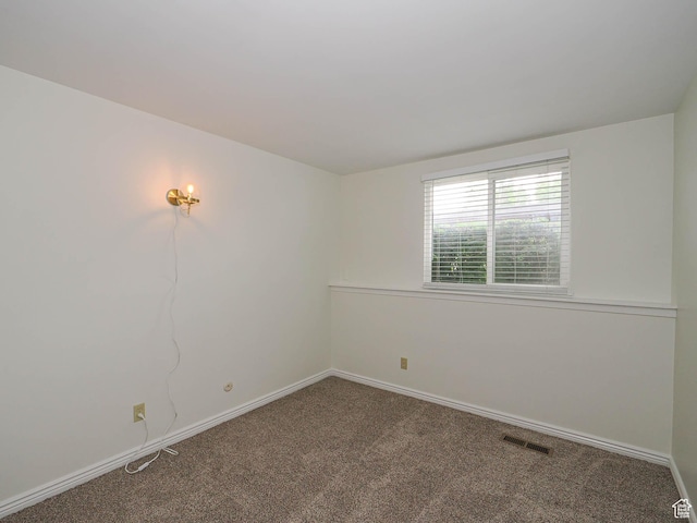 2760 S 2000 E Unit 6A, Salt Lake City, UT 84109 - unfurnished room featuring carpet floors and baseboards