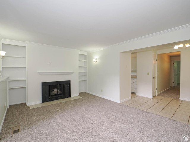 2760 S 2000 E Unit 6A, Salt Lake City, UT 84109 - unfurnished living room featuring carpet, a fireplace with flush hearth, built in shelves, crown molding, and baseboards