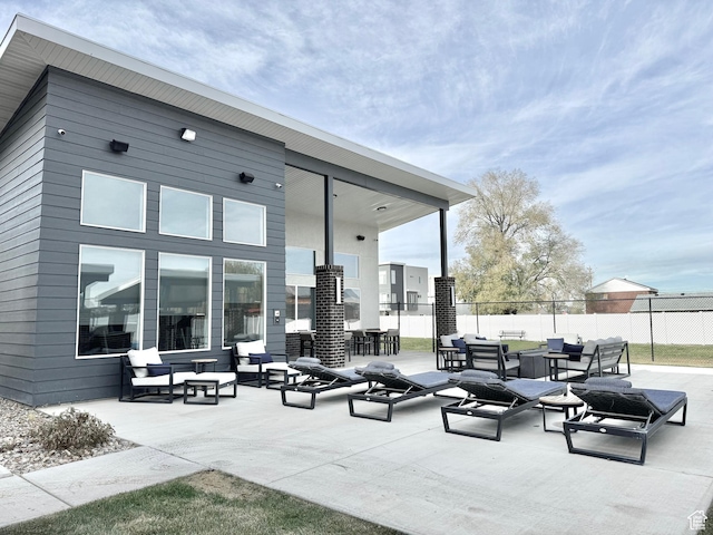 2336 W James Way Unit J34, West Haven, UT 84401 - view of patio featuring an outdoor living space and fence
