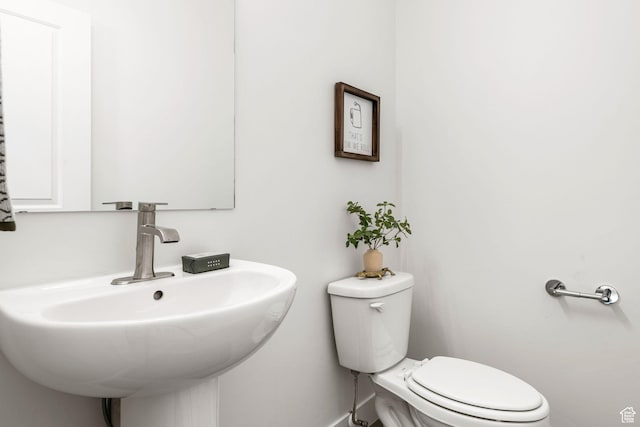 2336 W James Way Unit J34, West Haven, UT 84401 - half bath featuring a sink and toilet