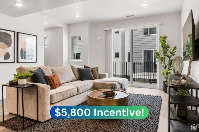 2336 W James Way Unit J34, West Haven, UT 84401 - living area featuring wood finished floors and recessed lighting