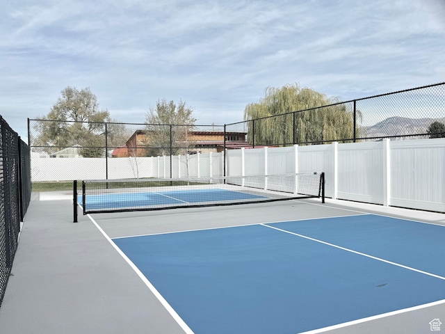 2336 W James Way Unit J34, West Haven, UT 84401 - view of tennis court featuring fence