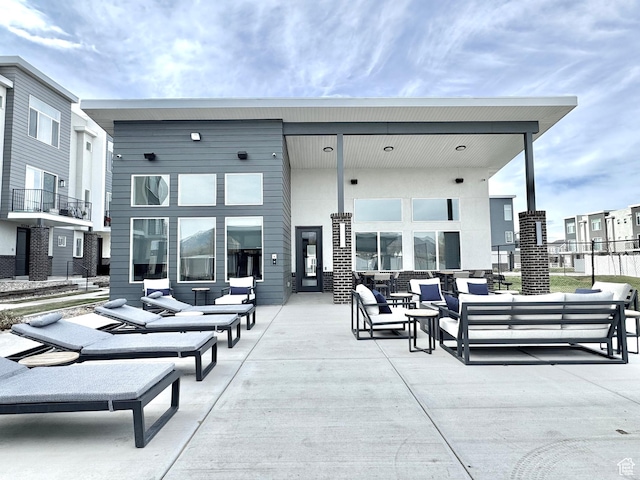 2336 W James Way Unit J34, West Haven, UT 84401 - view of patio featuring an outdoor living space
