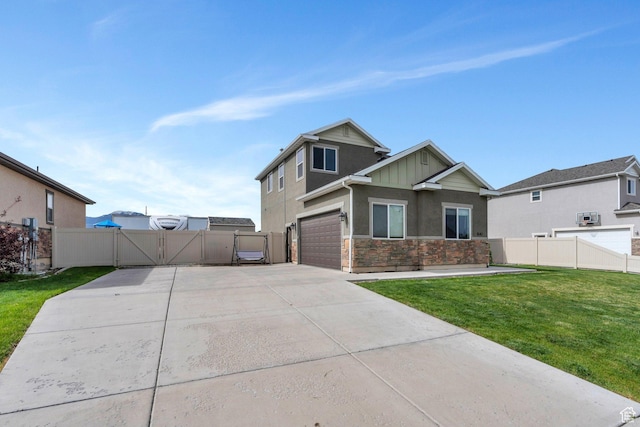 641 W 1450 S, Springville, UT 84663 - view of front of property featuring a gate, driveway, stone siding, stucco siding, and a garage